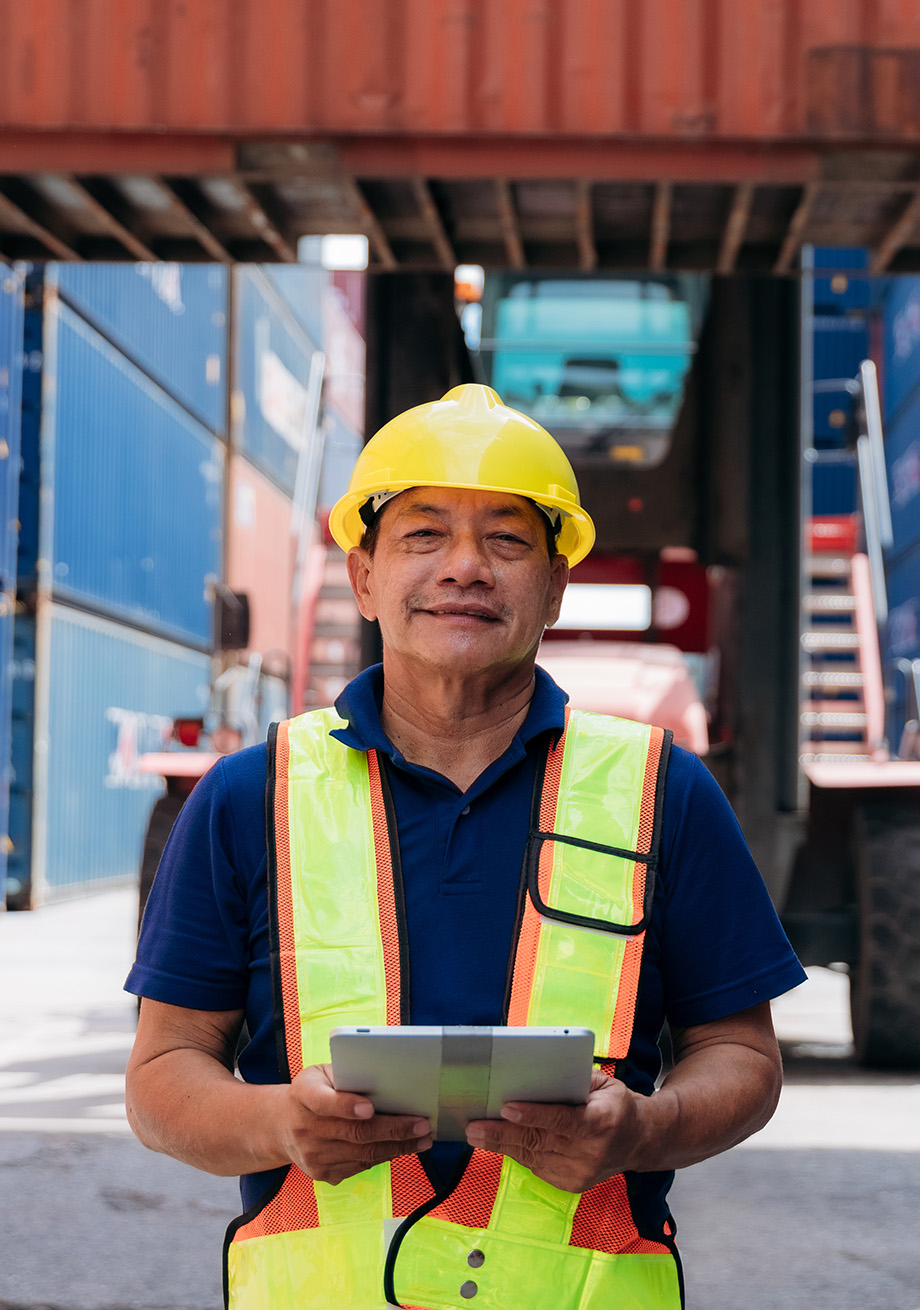 Warehouse team member holding a tablet